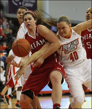 Miami’s Nicole Anderson and Bowling Green’s Jill Stein vie for the ball. With Sunday’s lopsided victory over the RedHawks, the Falcons improved to 10-1 in Mid-American Conference play.