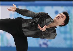 Patrick Chan of Canada competes in the men's team short program figure skating competition at the Iceberg Skating Palace Feb. 6.