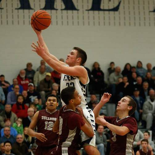 Lake-s-Connor-Bowen-flies-over-Rossford-defenders