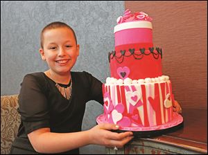 A little something Katie Secord, 11, of Toledo, whipped up with professional baker Wendy Kromer, of Wendy Kromer Confections of Sandusky, Ohio. 