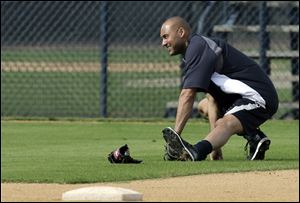 New York Yankees shortstop Derek Jeter stretches during practice at the Yankees' minor league facility today.