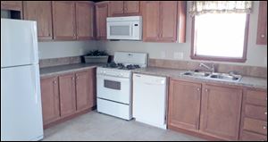 Home chefs will love cooking in this large, eat-in kitchen. Quality Whirlpool appliances are included. 