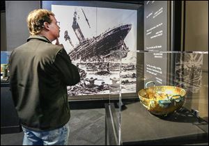 Whitehouse resident Mark Reaume tours ‘Titanic: The Artifact Exhibition’ at the Imagination Station in Toledo. The 6,500-square-foot exhibit includes passenger belongings and re-created staterooms.