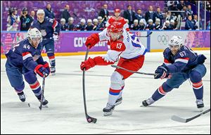Russia’s Pavel Datsyuk shoots the puck for his second goal of the game. He also scored in the shootout.