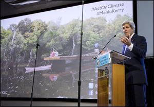 John Kerry makes a point during his speech Sunday in Jakarta, Indonesia, in which he cited a future pitted with catastrophes as a result of climate change.