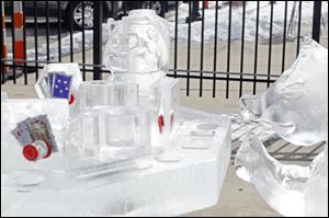 Local artists took part in Winterfest 2013’s ice carving competition with sculptures such as this one sponsored by Stella’s & Swig in downtown Perrysburg. This year’s Winterfest begins Friday.