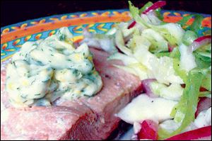 White wine-poached salmon with lemon dill mayonnaise and cabbage ‘n’ red onion slaw.