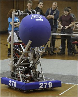 Toledo Technology Academy students test drive their robot, Mjölnir. It will be entered in a FIRST Robotics competition.