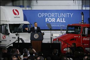 President Obama speaks at a distribution center for Safeway stores in Upper Marlboro, Md., today.