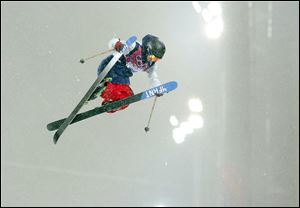 David Wise of the United States gets air during the men's ski halfpipe final at the Rosa Khutor Extreme Park, at the 2014 Winter Olympics, Tuesday, Feb. 18, 2014, in Krasnaya Polyana, Russia.  (AP Photo/Sergei Grits)