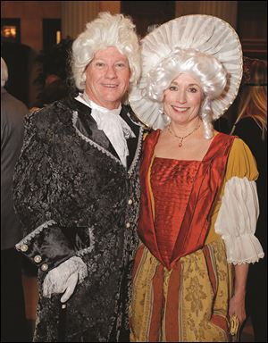 Jack Libbey and Susan Maxwell during the Masquerade Garden Party.