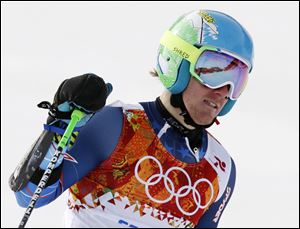 United States' Ted Ligety pauses after finishing  in the first run of the men's giant slalom at the Sochi 2014 Winter Olympics today in Krasnaya Polyana, Russia. 