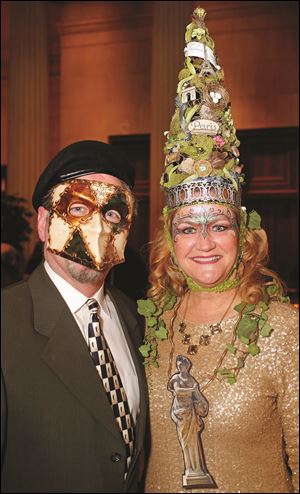 Tom and Kelly Sheehan during the Masquerade Garden Party.