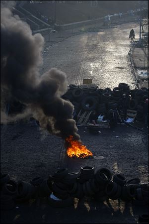 A fire burns on a barricade at Independence Square in Kiev, Ukraine.