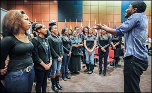 The University of Toledo gospel choir performs during Saturday’s event at the Main Library in Toledo celebrating the 50th anniversary of the Civil Rights Act.