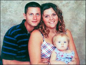 U.S. Army Sgt. Andy Eckert, with his wife, Tiffany Eckert, and first child, Marlee Freedom Eckert, was killed in Iraq on Mother’s Day, 2005, by a roadside bomb.