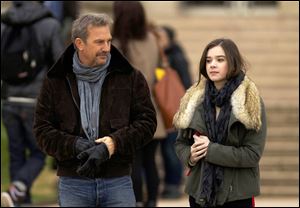Kevin Costner, left, and Hailee Steinfeld in a scene from 
