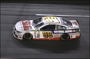 Dale Earnhardt, Jr., races to victory in the NASCAR Sprint Cup Series' first race of the season, the Daytona 500, on Sunday at Daytona International Speedway in Daytona Beach, Fla.