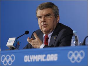 International Olympic Committee President Thomas Bach answers a question during a news conference at the 2014 Winter Olympics today in Sochi.