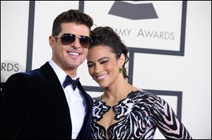 Robin Thicke, 36, and Paula Patton, 38, met when they were teenagers. They had a son, Julian Fuego Thicke, in 2010. 