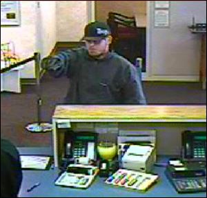 Surveillance footage from Education Plus Credit Union.