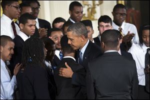 Joined at the White House by young men of color, President Obama called on America's businesses, philanthropists and government leaders to join forces to put more boys on a path toward successful lives. 