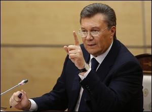 Ukraine's fugitive President Viktor Yanukovych gives a news conference in Rostov-on-Don, a city in southern Russia today.