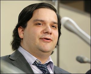 Mt. Gox CEO Mark Karpeles speaks at a news conference at the Justice Ministry in Tokyo today.