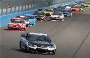 Kevin Harvick charged to the front early and dominated the rest of the way today for his second straight Sprint Cup victory at Phoenix International Raceway.