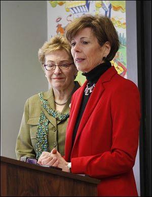 U.S. Rep. Marcy Kaptur (D., Toledo) and Kathleen Falk, right, Region V director for the U.S. Department of Health and Human Services, appear at a news conference at the River East Neighborhood Health Asso-ciation. They were reminding Ohioans to enroll for health insurance bythe March 31 deadline. 