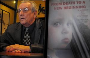 Tony Grotrian sits in in a cafe near the Hancock County Courthouse. ‘We are waking up more and more people’to the dangers of drug abuse, he says . Next to Mr. Grotrian is his memoir which includes a picture of his granddaughter Amiah Alise Grotrian on the front.
