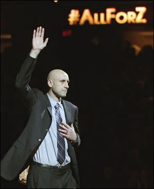 Zydrunas Ilgauskas is introduced during halftime of an NBA basketball game between the New York Knicks and the Cleveland Cavaliers on Saturday, March 8, 2014, in Cleveland.