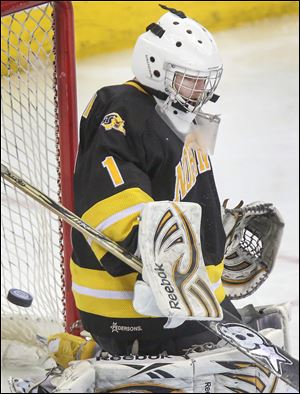 Northview goalie David Marsh rebuffs yet another shot on goal in the seventh overtime. Marsh had a total of 77 saves in the championship game in Columbus.