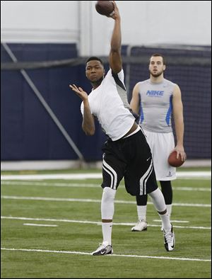 Former Rocket Terrence Owens was on the mark at pro day, completing all but one of his pass attempts.