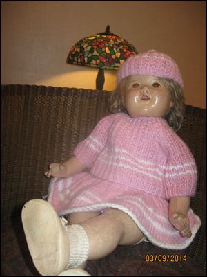 This Shirley Temple doll is showing her age, but she remains a source of memories and joy.