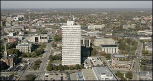 Neither the city nor the county is technically behind in rent for space at One Government Center because the Ohio Department of Administrative Services hasn’t billed for rent since July 1, officials said.