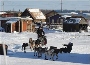 Dallas Seavey leaves the Yukon River village of Kaltag during the 2014 Iditarod Trail Sled Dog Race Saturday.