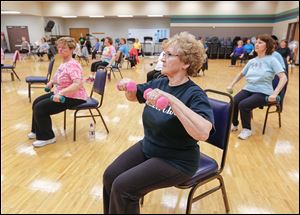 Liane Owed of Ottawa Hills, front, works out in the Jazzercise class. The class meets every day for an hour.    The Sylvania Senior Center offers a wide variety of activities and opportunities for area seniors.