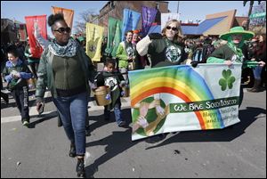 A group standing for diversity marches in the annual St. Patrick's Day parade in the South Boston neighborhood of Boston.