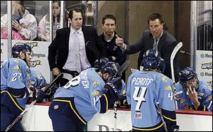 John Vigilante, left, and Derek Booth filled in for Walleye interim head coach Dan Watson, who missed the game because of the birth of his daughter.