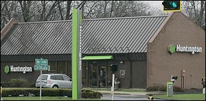 Huntington Bank said its policy of dropping overdraft protection transfer fees will affect 10 percent of small busines customers. 