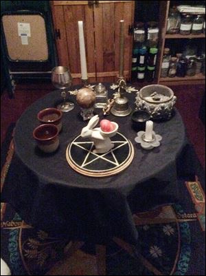 An altar in the home of Lady Bona Dea Lyonesse (Patricia DeSandro, 64), founder of Circle of the Sacred Grove Temple of the Old Religion in Erie.