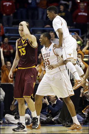 Texas sophomore Cameron Ridley (55) has shed more than 30 pounds since his freshman year and had the game-winning shot against Arizona State on Thursday.