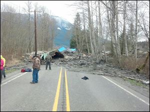 The aftermath of a mudslide that moved a house with people inside in Snohomish County.