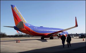 Southwest Airlines Flight 4013 sits at the M. Graham Clark Downtown Airport in Hollister, Mo., on Jan. 13.