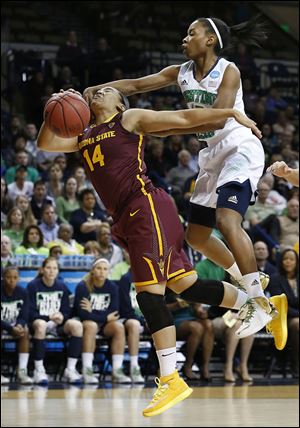 Arizona State’s Adrianne Thomas is fouled in the first half by Notre Dame’s Lindsay Allen. Thomas scored 14 points for ASU.