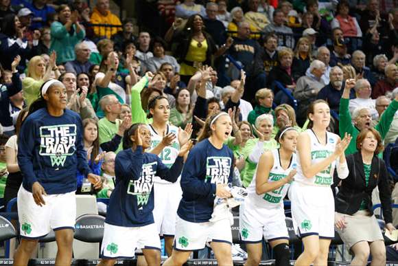 UND-players-and-fans-applaud-after-a-Jewel-Loyd-score