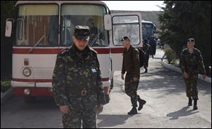 Ukrainian marines prepare to leave their base in Feodosia, Crimea.
