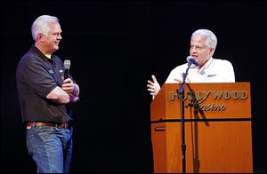 ARCA driver Frank Kimmel, left, speaks with Don Radebaugh, the communications and multimedia manager of ARCA, during the league’s news conference Tuesday at Hollywood Casino in Toledo. Racing at Toledo Speedway begins April 12.