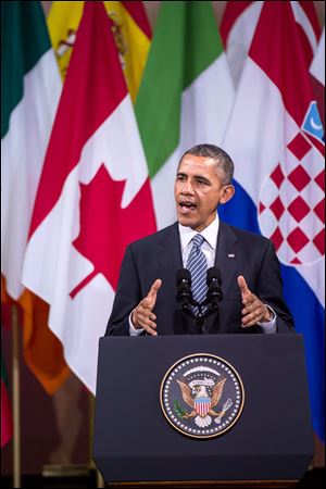 U.S. President Barack Obama talks at The Centre for Fine Arts in Brussels.